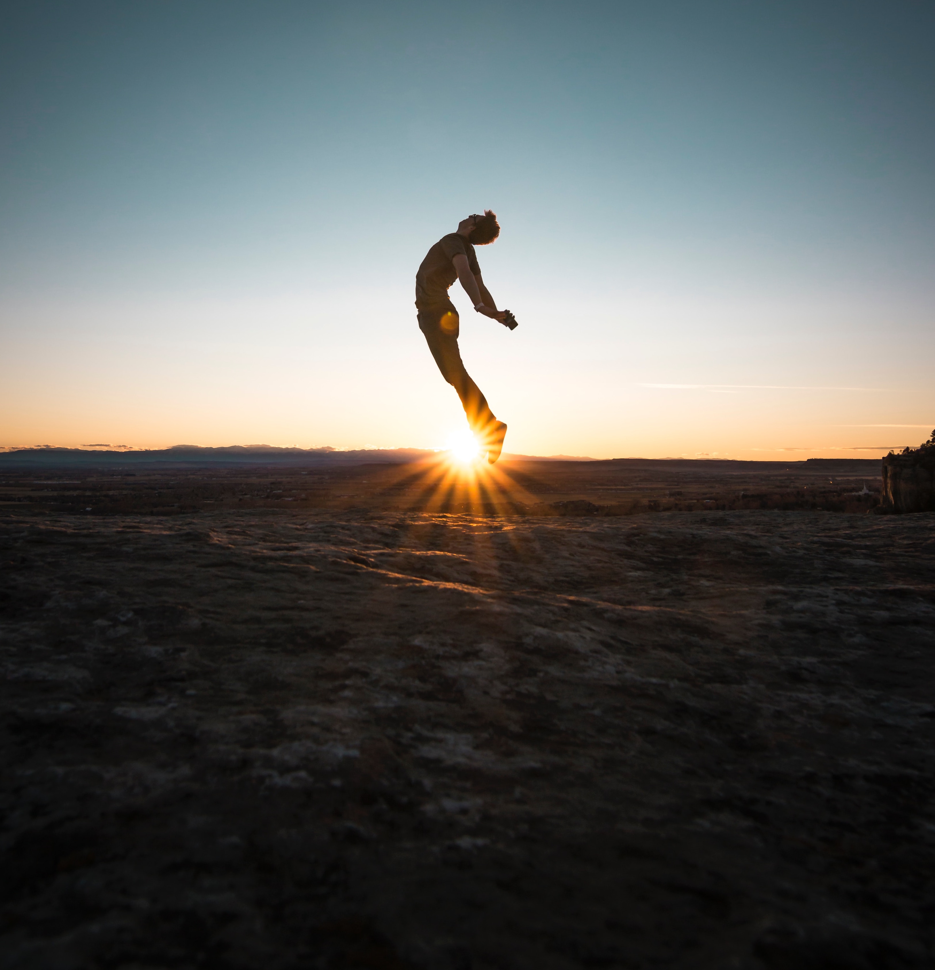 man jumping at sunset by steve-halama-8Bm5IUQ387A-unsplash small
